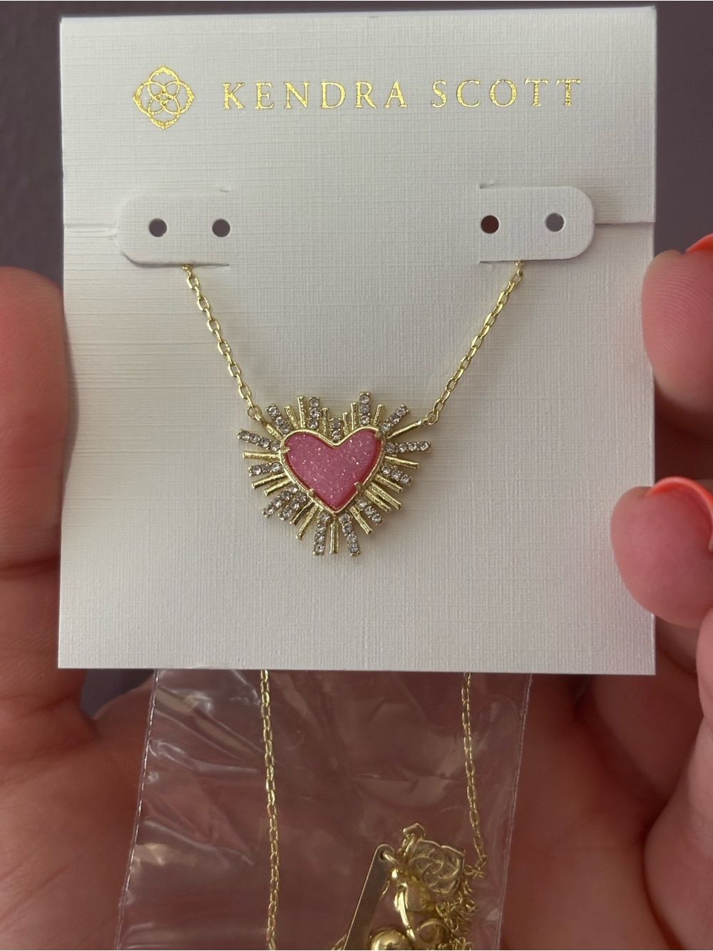 Kendra Scott Gold Necklace with Pink Heart Sunburst Pendant